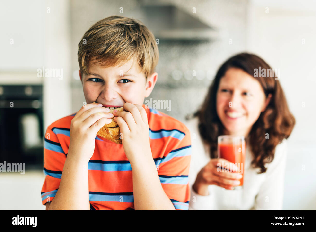 Parent Child Kid Meal Juice Bread Boy Starving Concept Stock Photo