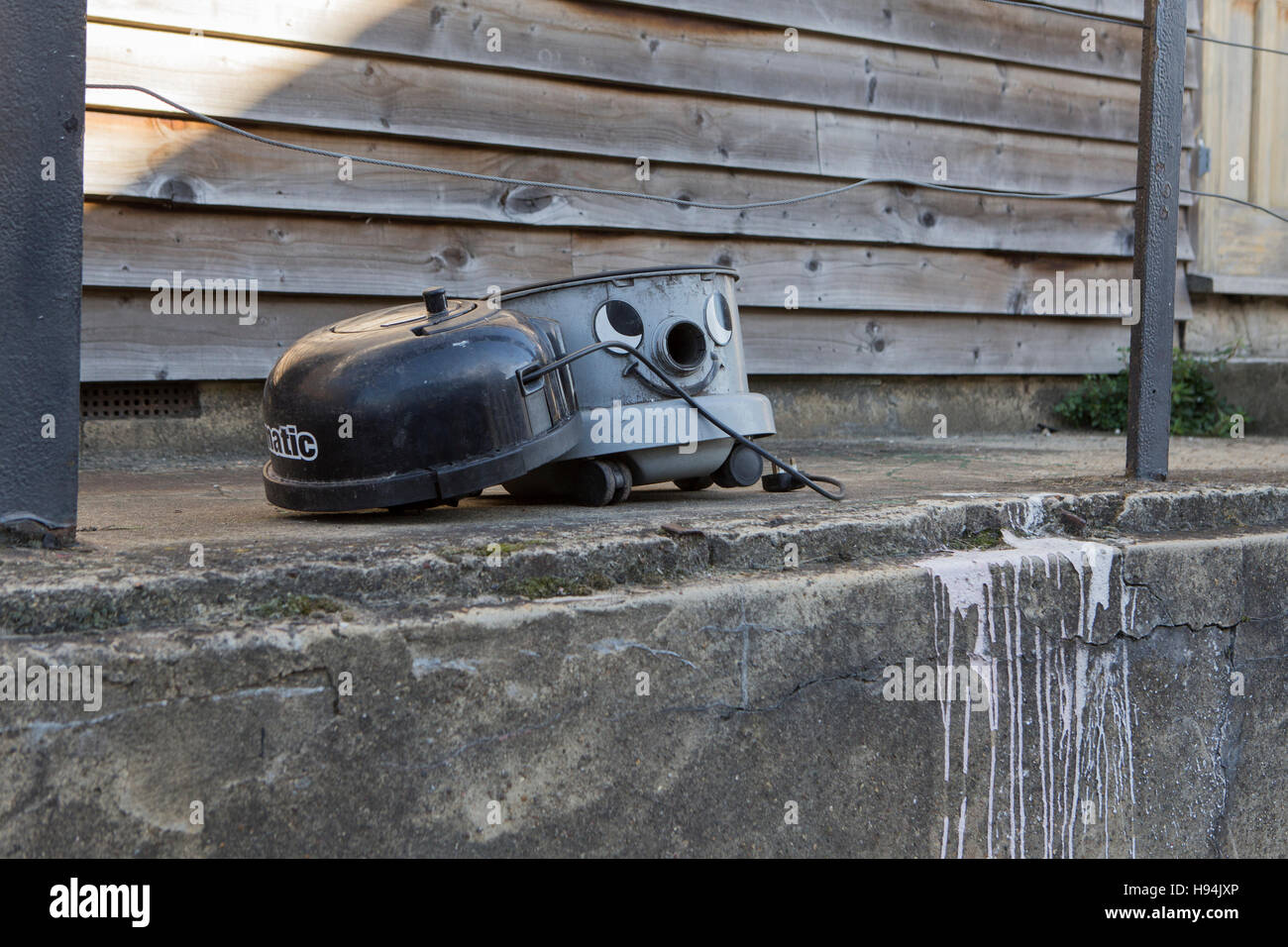 A discarded Henry style vacuum cleaner. Stock Photo