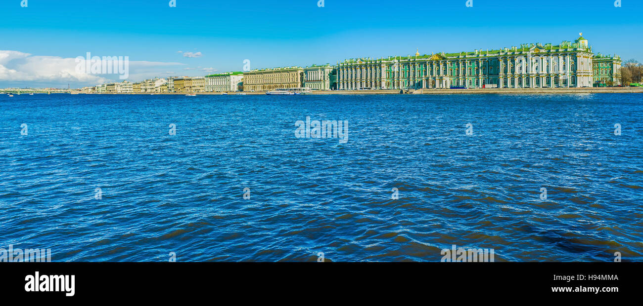 The stylish Neva embankment with beautiful architectural masterpieces of the Russian monarchy in Saint Petersburg. Stock Photo