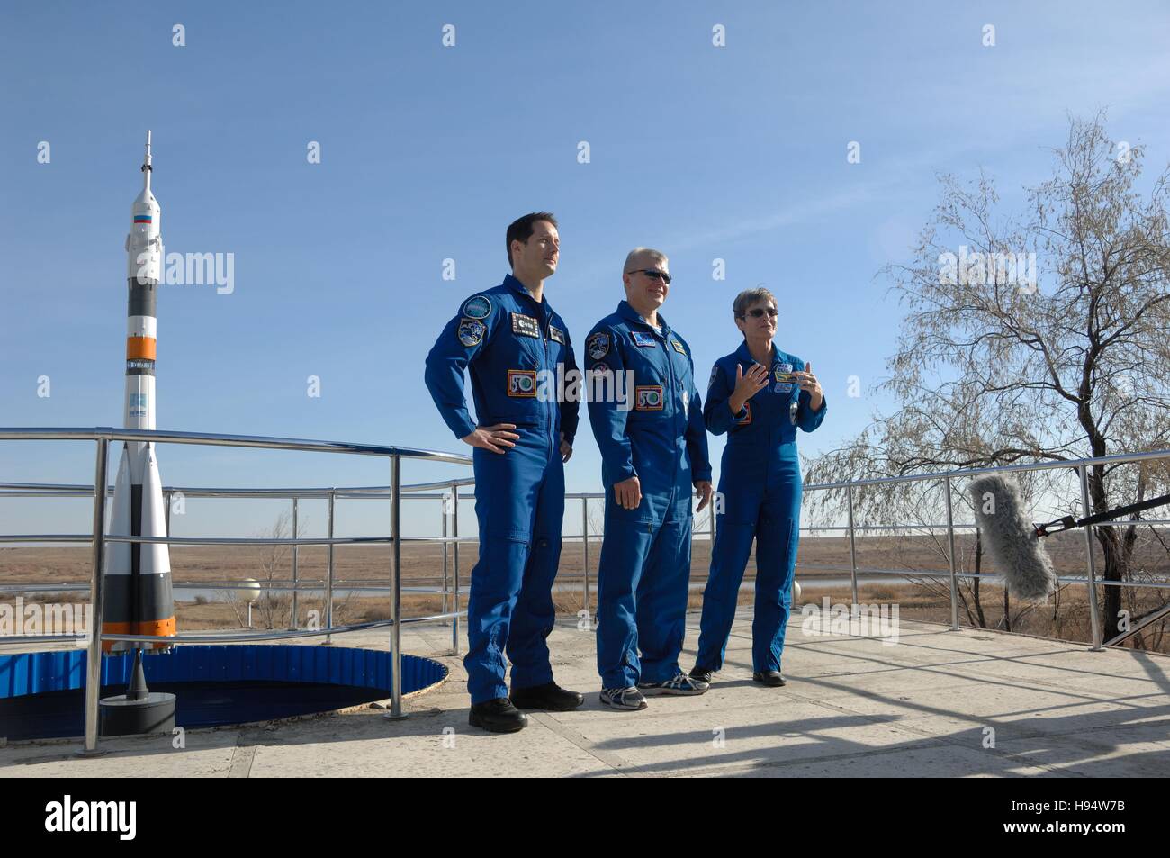 NASA International Space Station Expedition 50-51 prime crew members (L-R) French astronaut Thomas Pesquet of the European Space Agency, Russian cosmonaut Oleg Novitskiy of Roscosmos, and American astronaut Peggy Whitson answer questions during preflight activities at the Cosmonaut Hotel November 10, 2016 in Baikonur, Kazakhstan. Stock Photo