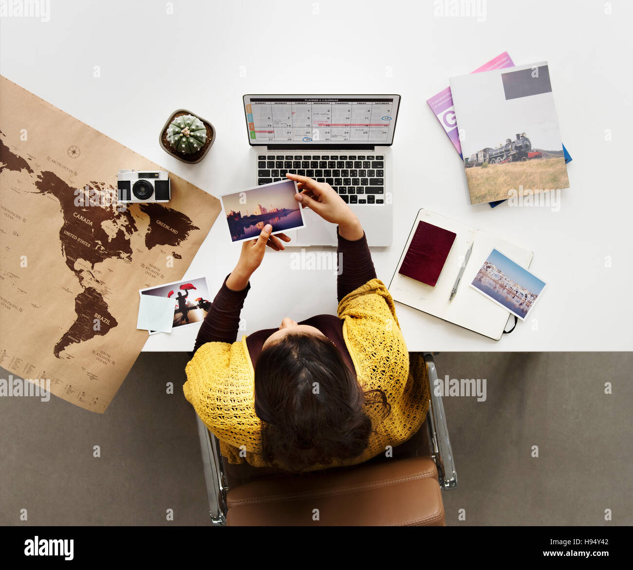 Planning a trip laptop map hi-res stock photography and images - Alamy