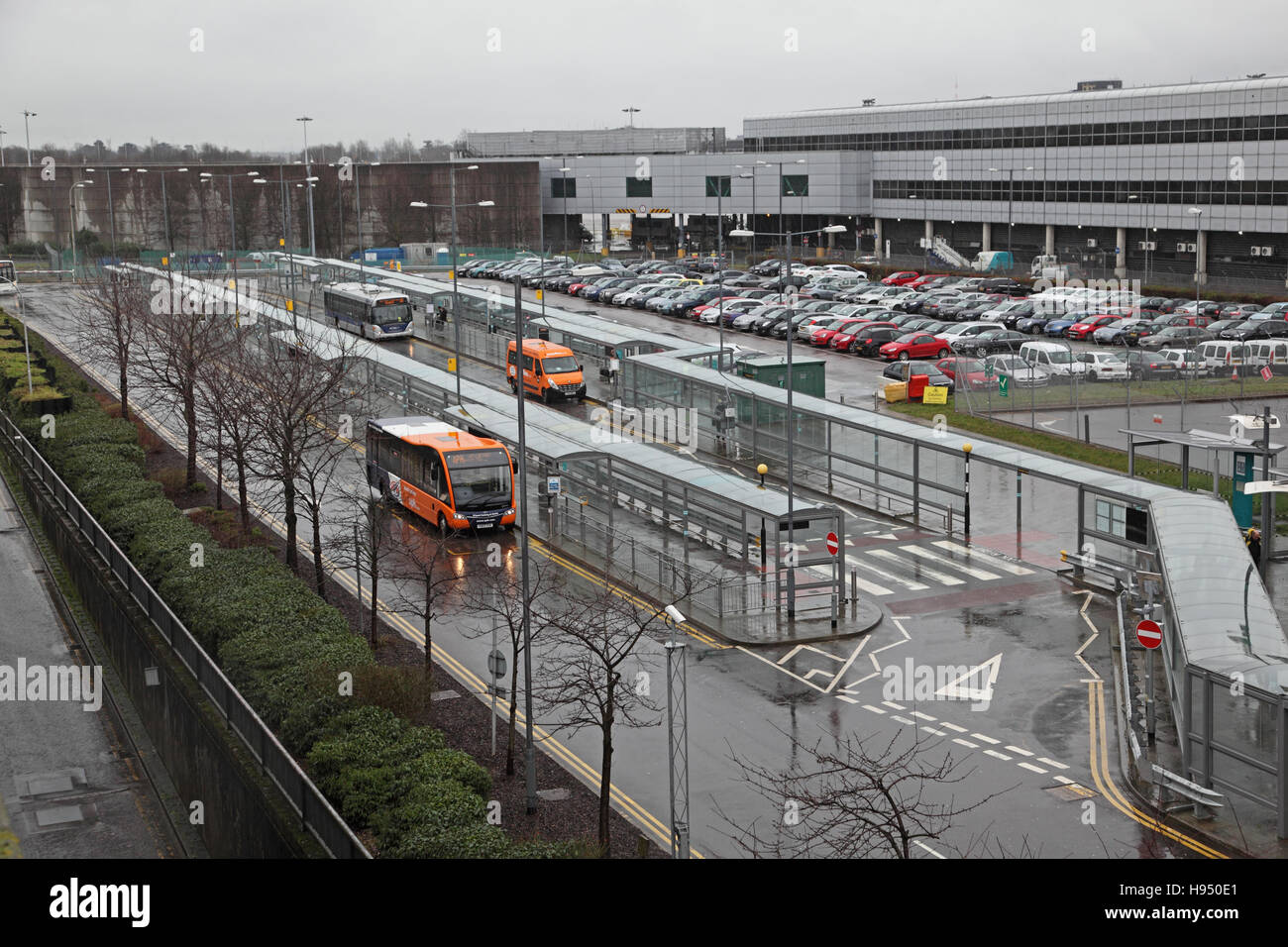 High level view of the bus stop area at Gatwick Airport's North Terminal on a dull, wet, winter day Stock Photo