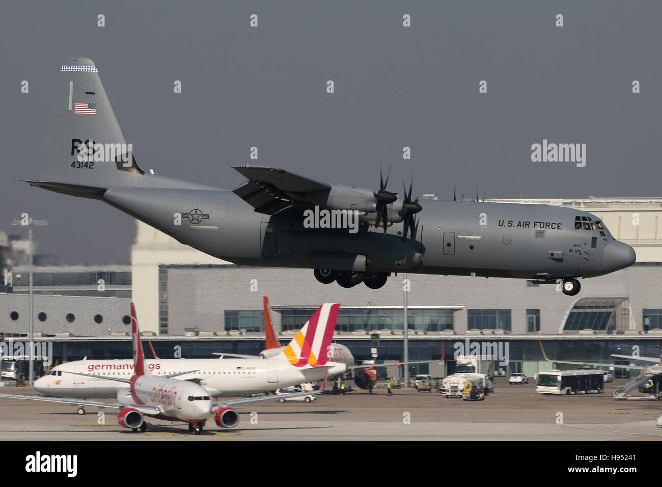 Stuttgart, Germany – March 18, 2016: US Air Force, Hercules C-130 is landing at Stuttgart Airport Stock Photo