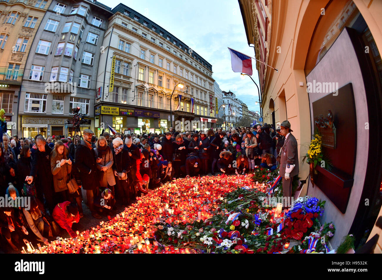 Thousands of people light candles as they pay respect to the 1989 events that lead to fall of communism in front of the memorial plaque marking the November 17, 1989 events on Narodni street in Prague, Czech Republic, on Thursday, November 17, 2016. The Day of Struggle for Freedom and Democracy on November 17 commemorates student demonstrations after the Nazi occupation in 1939 and against the Communist regime in 1989. Communist police cordoned off a student protest march in the Prague centre on November 17, 1989 and then brutally beat up its participants. The police violence triggered the eve Stock Photo
