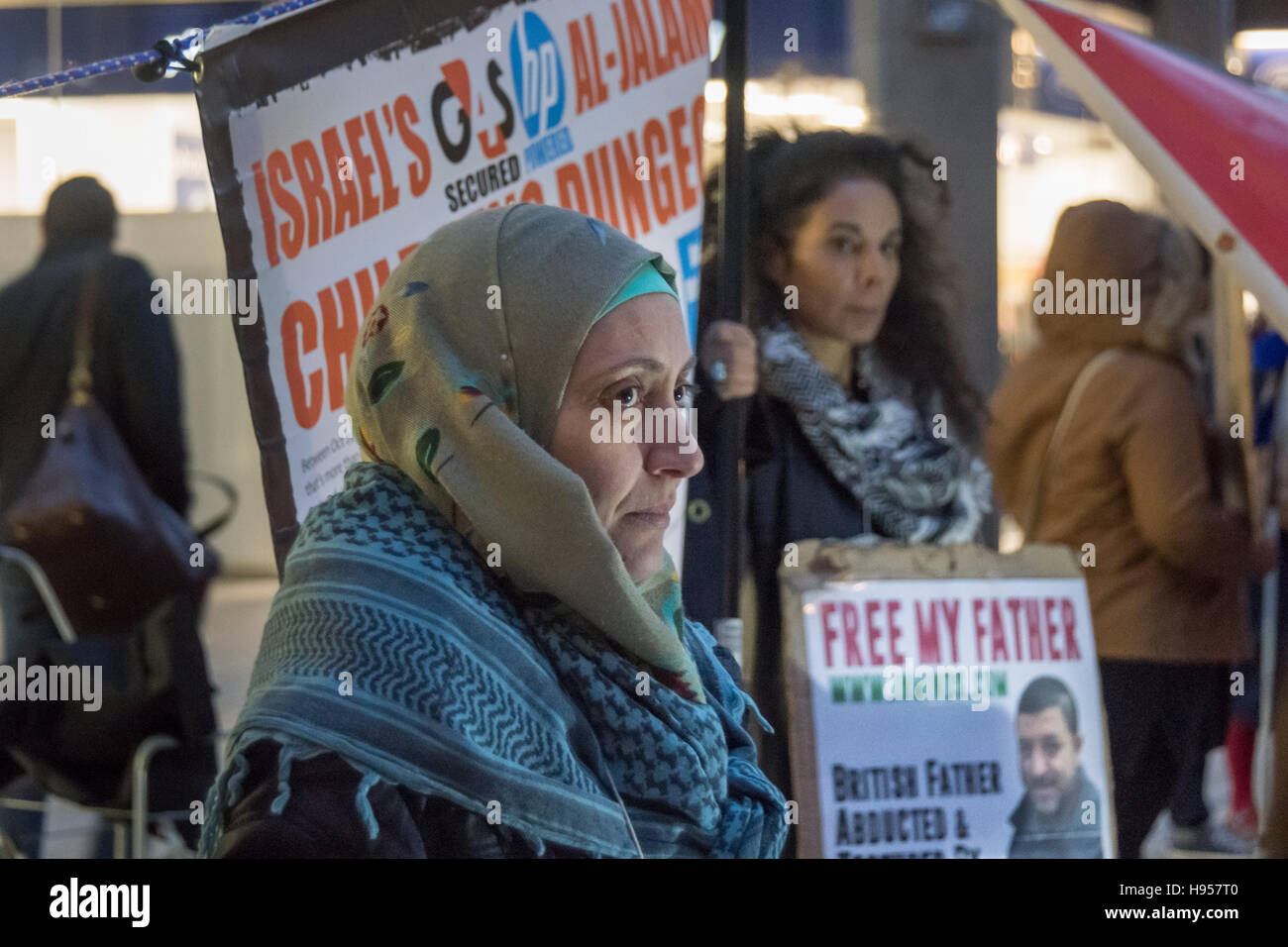 London, UK. 18th November 2016. Laila Sharary, wife of Fayez Shahary at the protest by human rights group Inminds outside the headquarters of British security company G4S over the abduction by Israel and subsequent torture of British national and father of five Fayez Sharary. Arrested by Israeli forces  on 15 September when leaving the West Bank for Jordan with his wife and youngest child to fly home after a family visit he was tortured for 3 weeks by Israeli secret police to force a confession An Israeli judge declared this worthless and inadmissible and ordered his release but he is still he Stock Photo