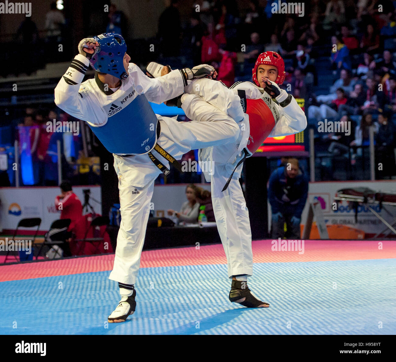 Burnaby, Canada. 18 November, 2016. WTF World Taekwondo Junior Championships, Yazan Ihmeda (JOR) blue and Sherif Hassan (CAN), compete in male 63kg Alamy Live News/ Peter Llewellyn Stock Photo