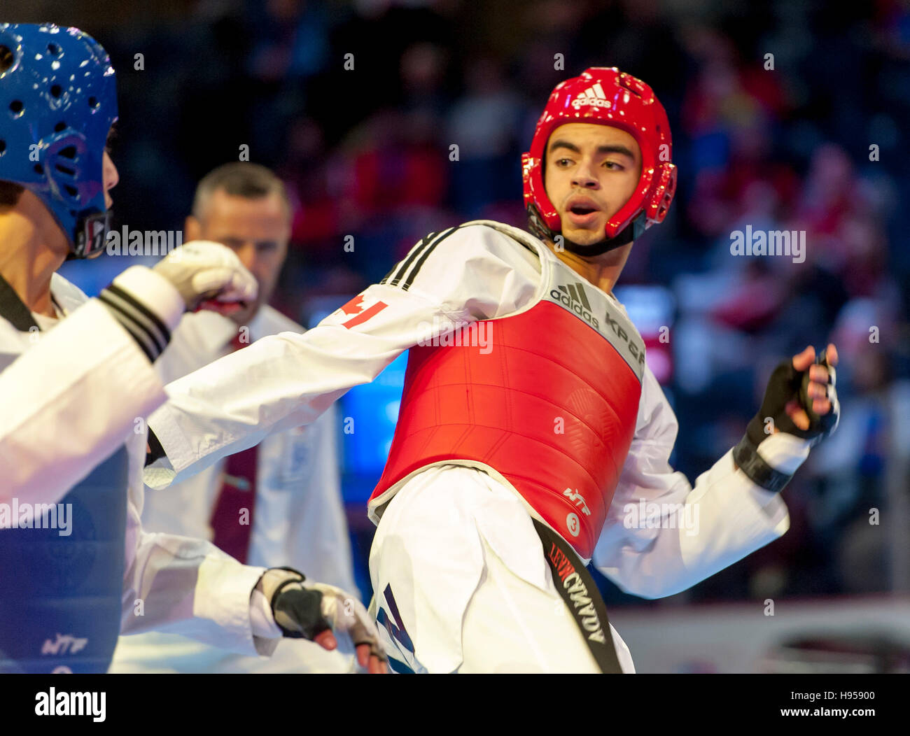 Burnaby, Canada. 18 November, 2016. WTF World Taekwondo Junior Championships, Yazan Ihmeda (JOR) blue and Sherif Hassan (CAN), compete in male 63kg Alamy Live News/ Peter Llewellyn Stock Photo