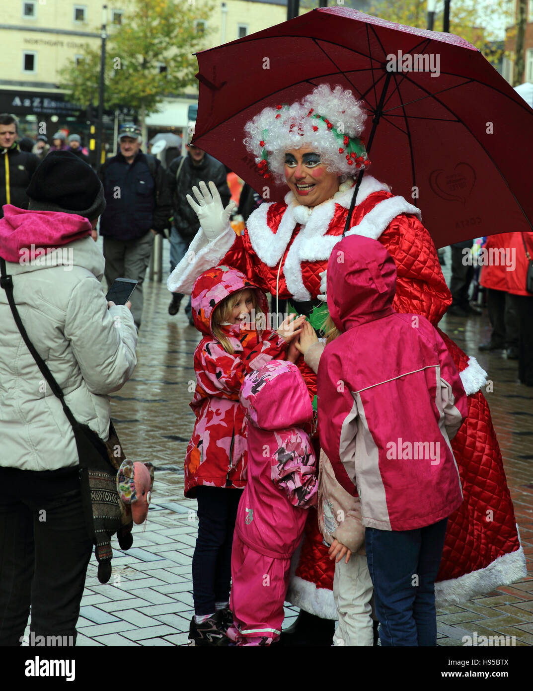 Mother Christmas entertaining visitors at the Wakefield Christmas market, Wakefield, West Yorkshire, UK Stock Photo