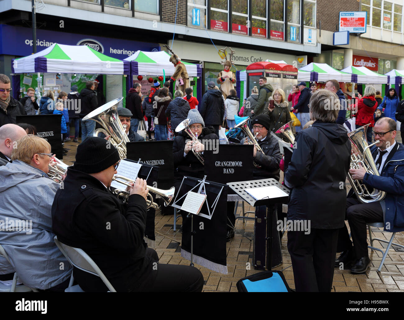 Grangemoor band entertaining visitors at the Wakefield Christmas market, Wakefield, West Yorkshire, UK Stock Photo