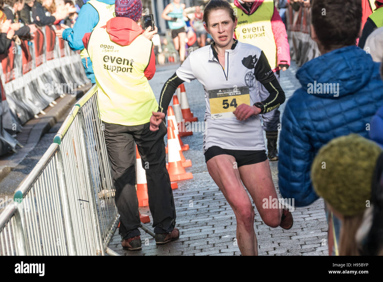 Kendal Cumbria UK, 19th November 2016,Sport news, Kendal mountain festival 10k trail run gets under way. A packed Kendal watches on as the first home in the womens race is Heidi Dent.copyright Gary Telford/Alamy live news Stock Photo