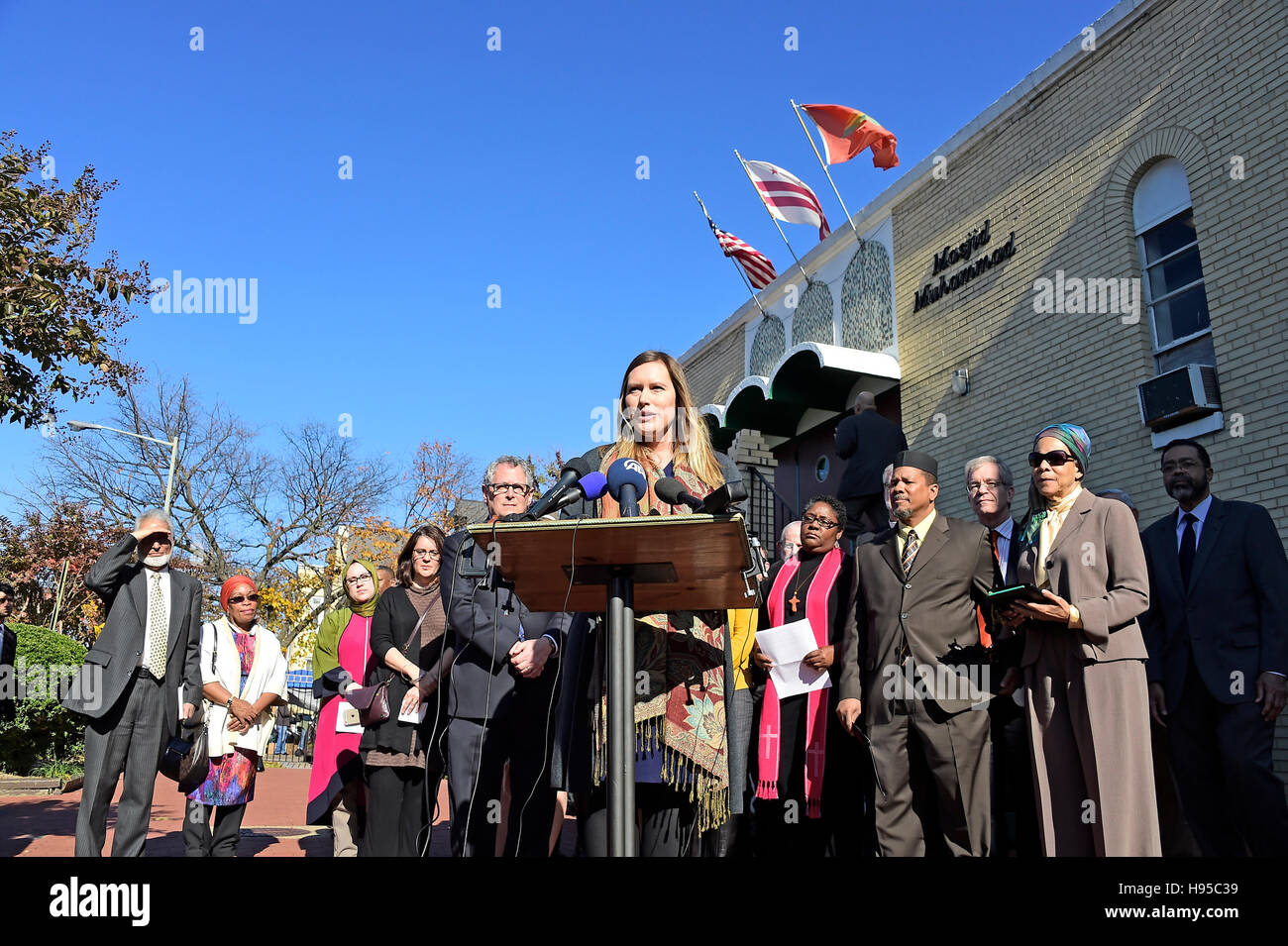 Washington, USA. 18th Nov, 2016. Catherine Orsborn (pictured), Campaign Director of Shoulder to Shoulder, an interfaith organization dedicated to ending anti-Muslim bigotry, speaks at a press conference calling on President-elect Donald Trump to respect religious liberty. In the aftermath of the election and in response to the rising hate crimes against Muslims, national Christian and Jewish leaders joined their Muslim colleagues at Masjid Muhammad in Washington, DC on Friday, November 18, 2016 for the daily Muslim prayer service. Credit: Ron Sachs/CNP /MediaPunch © MediaPunch Inc/Alamy Live N Stock Photo