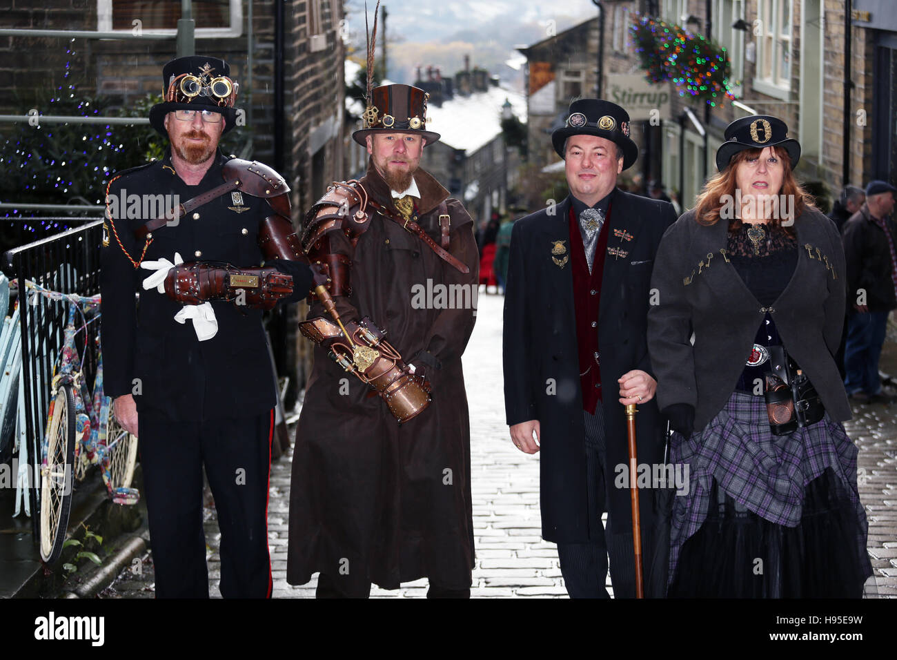 Haworth, UK. 19th Nov, 2016. Four people dressed in Steampunk clothing designs on the high street in Haworth, 19th November 2016. Credit:  Barbara Cook/Alamy Live News Stock Photo