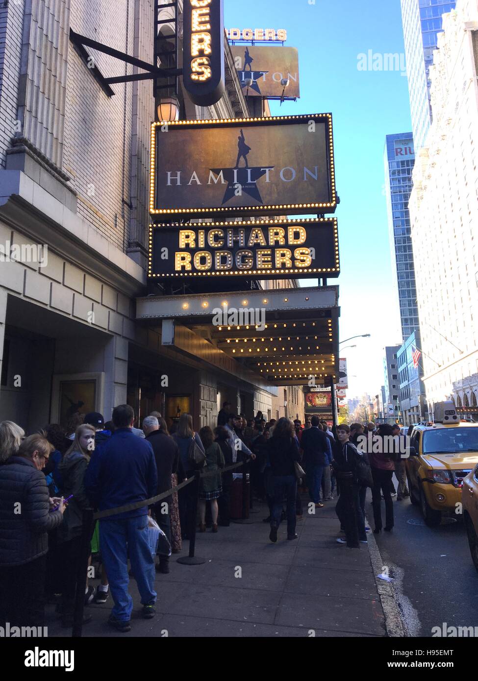 New York, NY, USA. 19th Nov, 2016. 'Hamilton' ticket holders wait in line at the Richard Rodgers Theater in Times Square the afternoon after Vice-President Elect Mike Pence was reportedly booed while attending a performance of the Broadway musical and where cast member Brandon Victor Dixon addressed Pence directly during the curtain call in New York, New York on November 19, 2016. © Rainmaker Photo/Media Punch/Alamy Live News Stock Photo