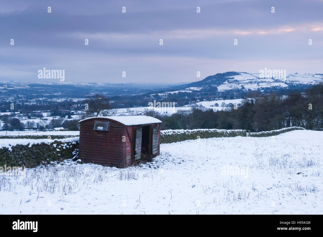 Cold, snowy, winter morning view of the Wharfedale rural landscape, overlooked by  Otley Chevin - West Yorkshire, England. Stock Photo