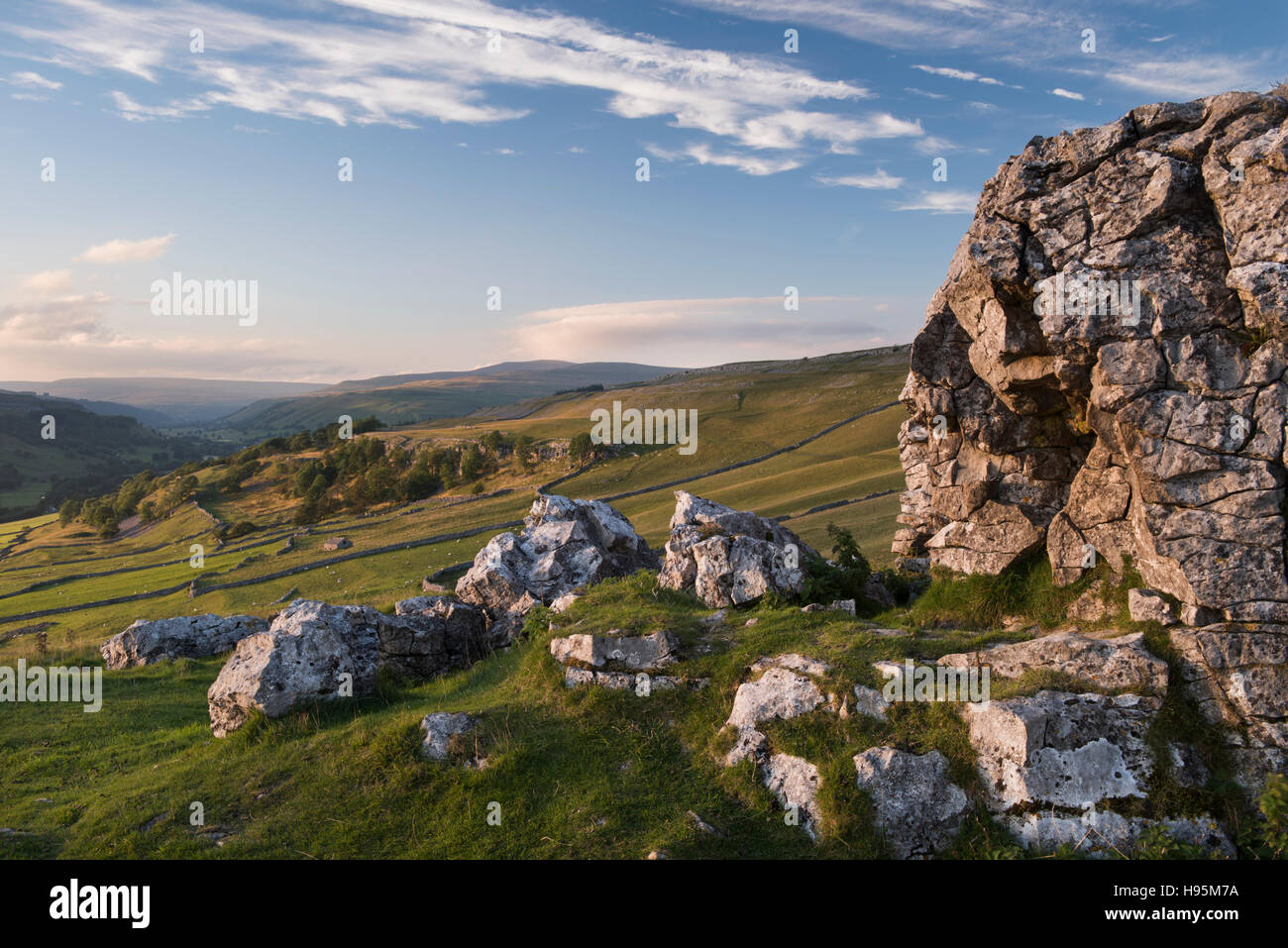 Summer evening view of beautiful Yorkshire Dales countryside seen from Conistone Pie, a limestone outcrop - North Yorkshire, GB. Stock Photo