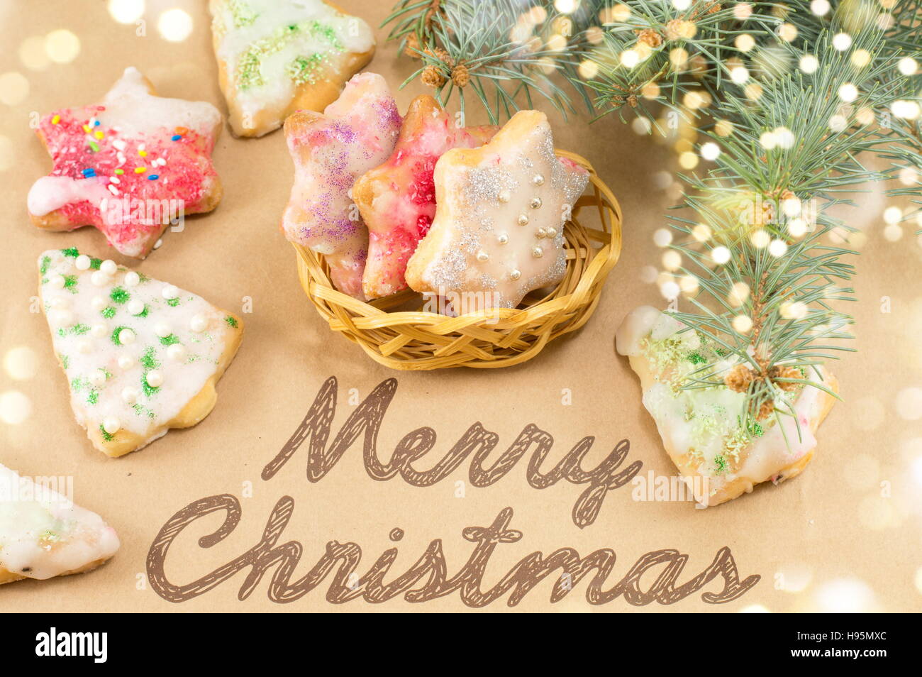 Merry Christmas card with decorated cookies and treats Stock Photo