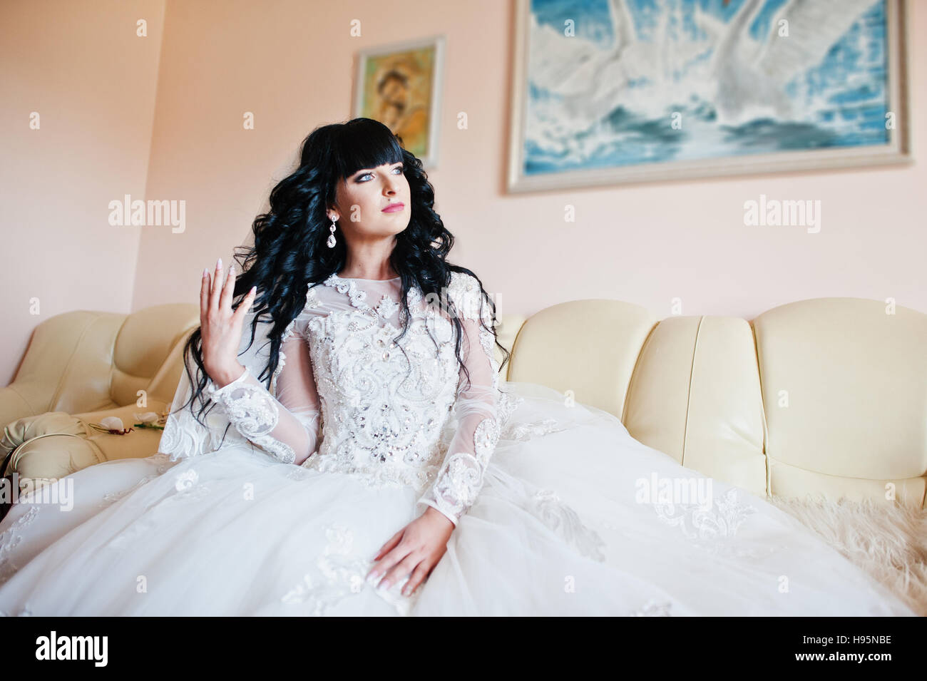 Bride sitting on couch hi-res stock photography and images - Alamy