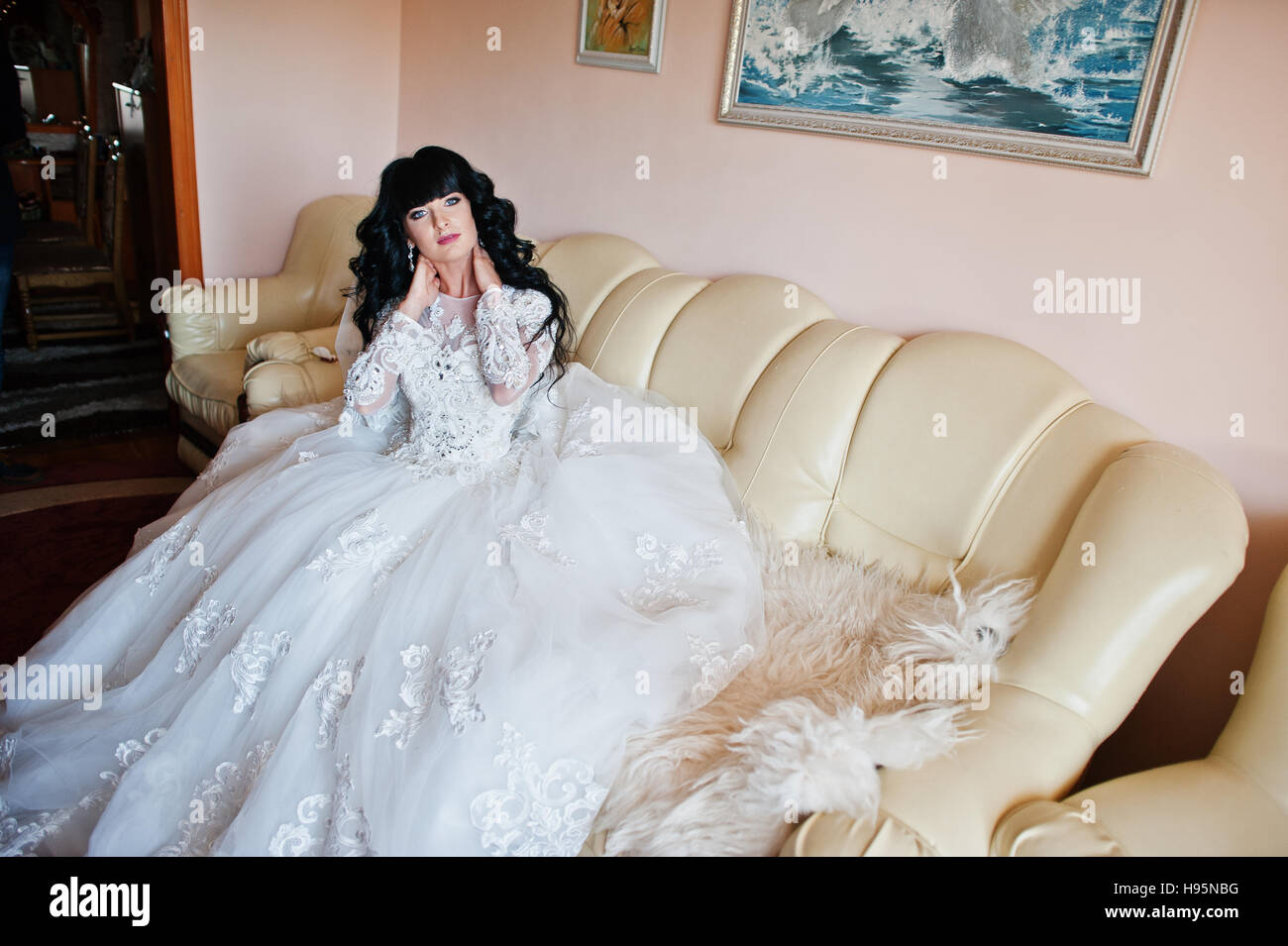 Bride sitting on couch hi-res stock photography and images - Alamy