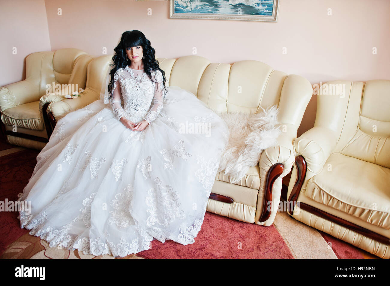 Bride sitting on couch hi-res stock photography and images - Alamy
