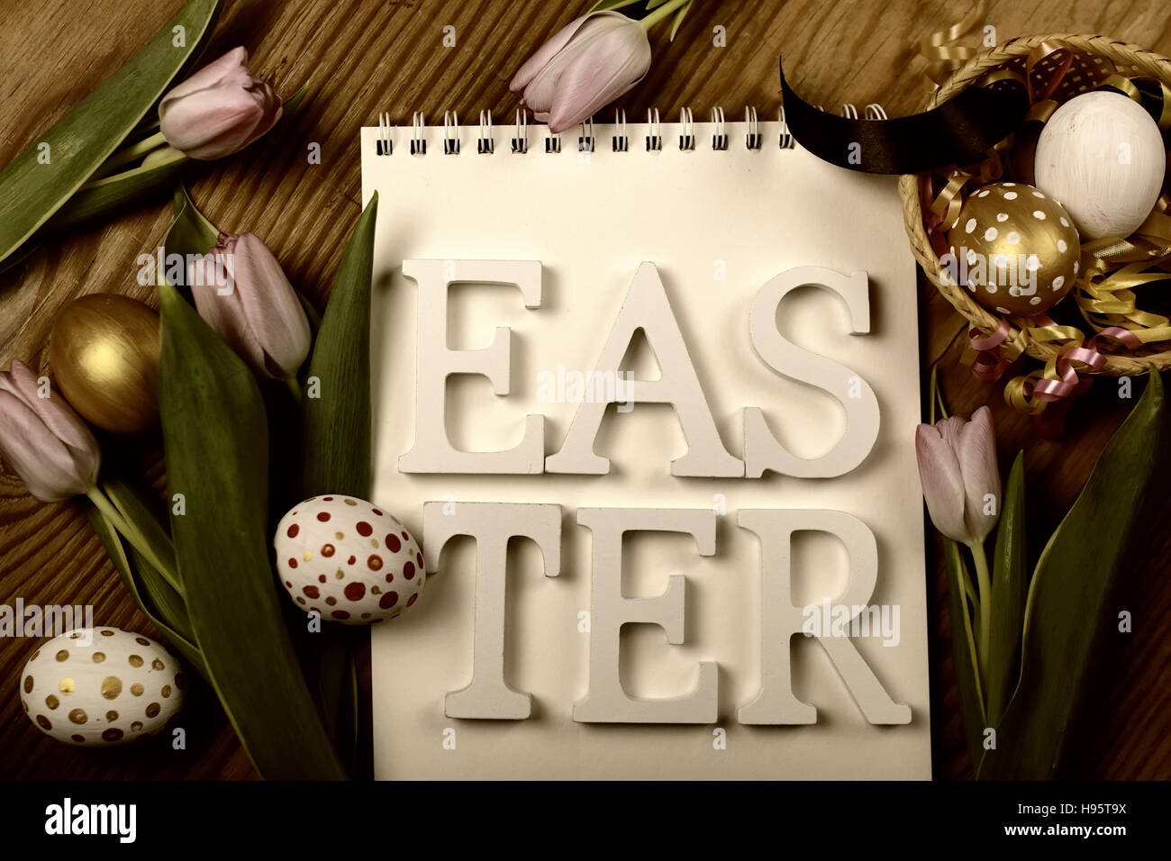 Toned background easter tulips and eggs Stock Photo - Alamy