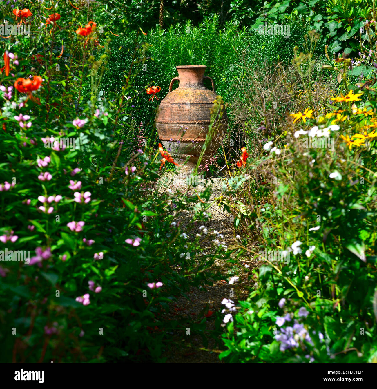 garden urn grecian style garden design mix mixed perennial bed borders gardens RM Floral Stock Photo