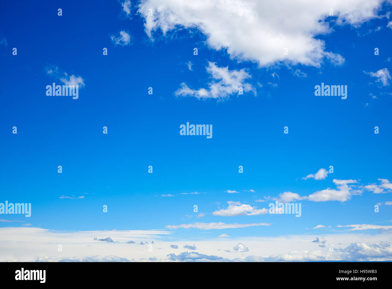 Blue sky with white clouds in a sunny summer day Stock Photo