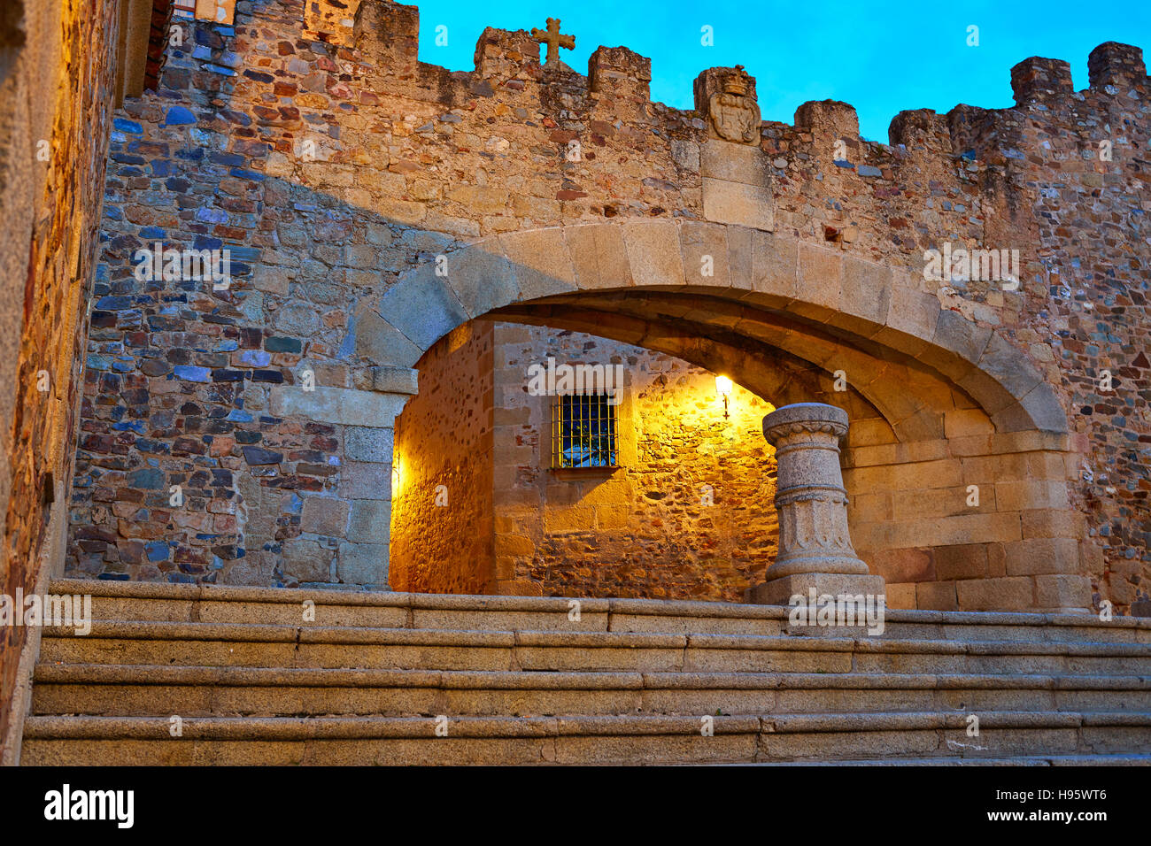 Caceres Arco de la Estrella Star arch sunset in Spain entrance to monumental city Stock Photo