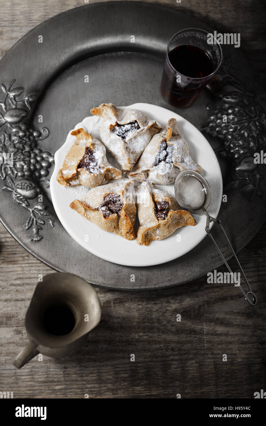 Symbols of Purim holiday including Jewish Pastry Hamantaschen Stock