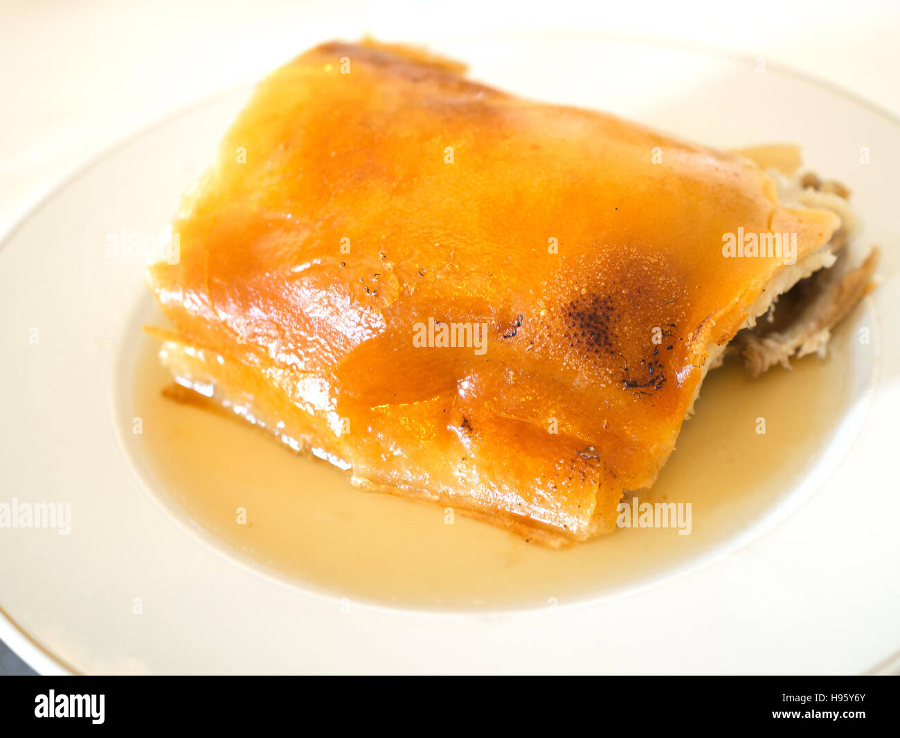 Roast suckling pig traditional cuisine of Segovia, Spain Stock Photo