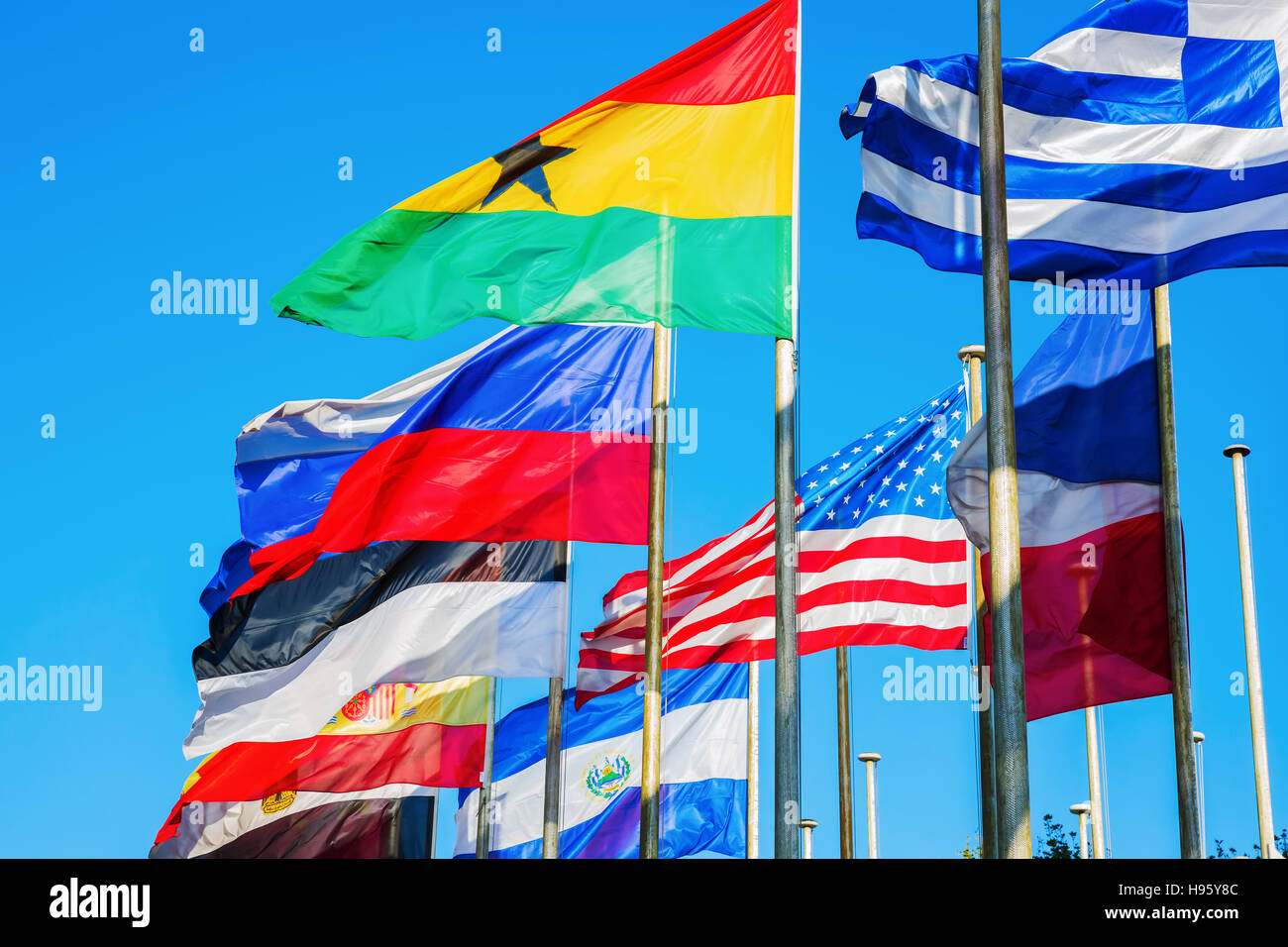 blowing flags of the world behind each other Stock Photo