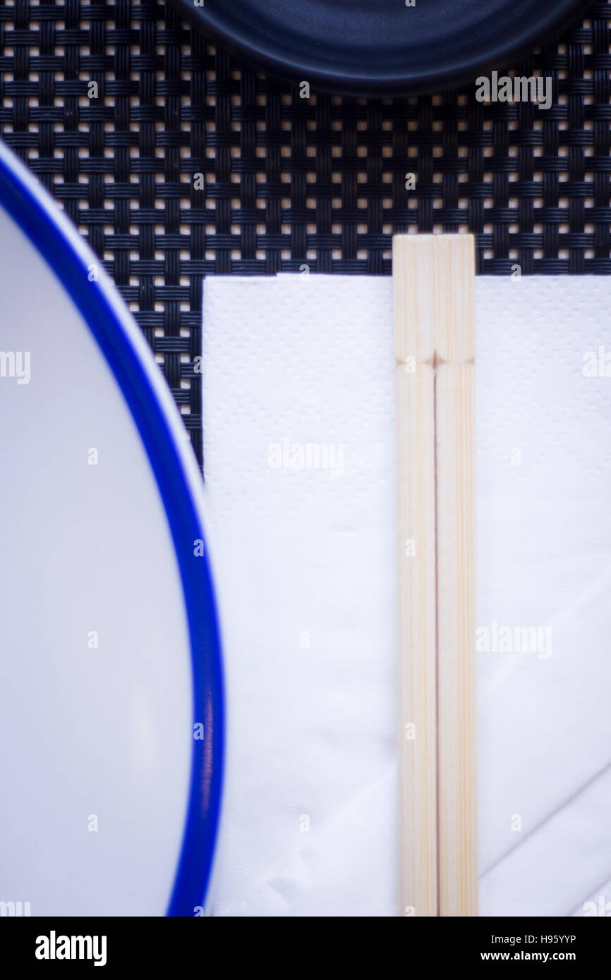 Asian chopsticks in Japanese restaurant to eat sushi and oriental