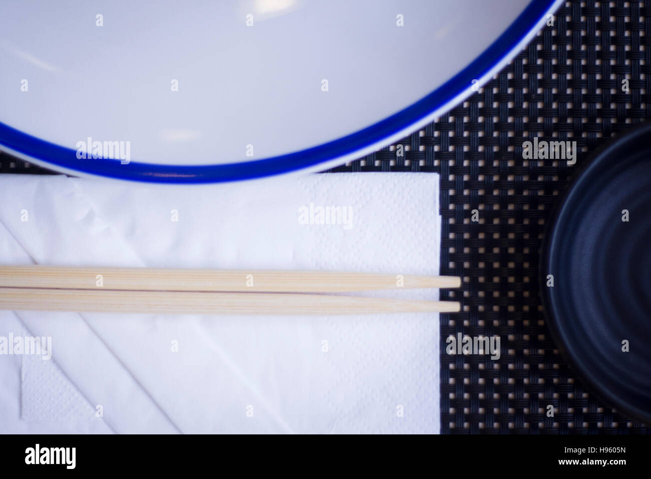 Asian chopsticks in Japanese restaurant to eat sushi and oriental