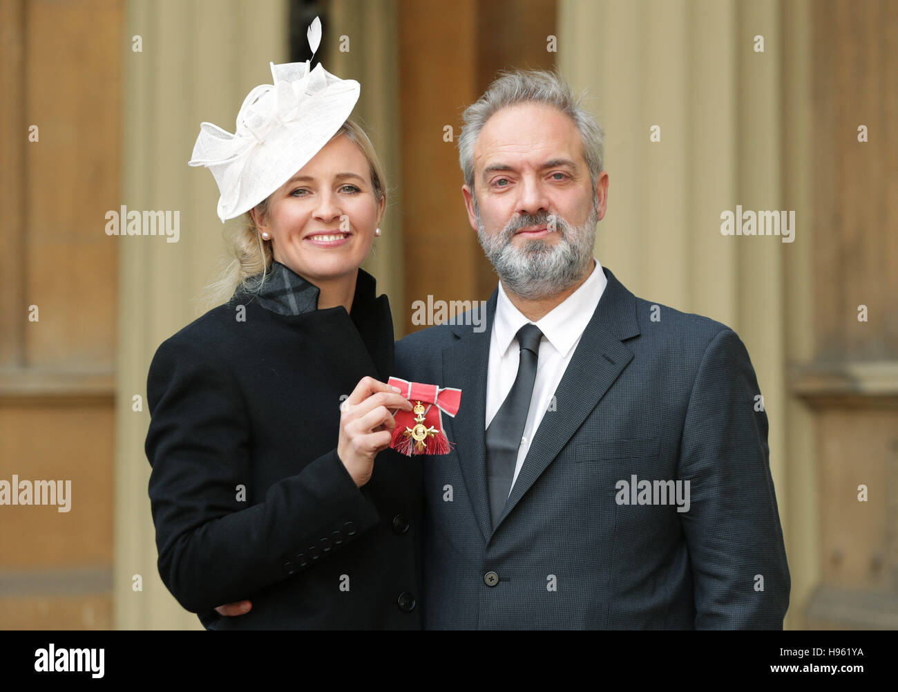 Sam Mendes with Alison Balsom after she received her OBE by the Prince