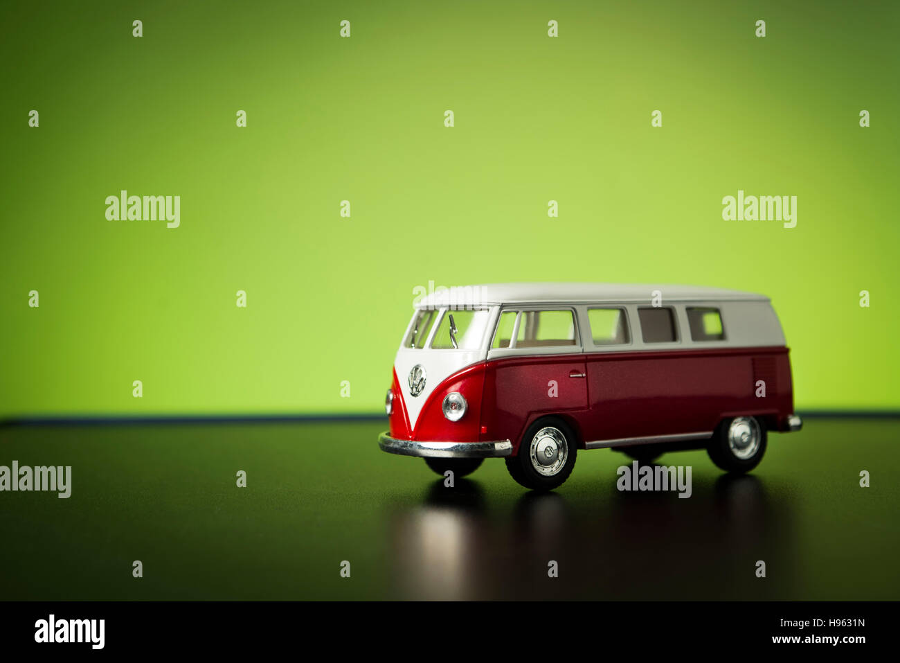 Izmir, Turkey - July 23, 2015. Volkswagen microbus toy car on a green background. Stock Photo