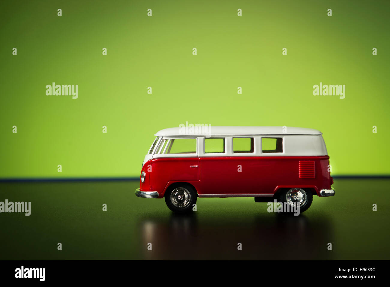 Izmir, Turkey - July 23, 2015. Volkswagen microbus toy car on a green background. Stock Photo