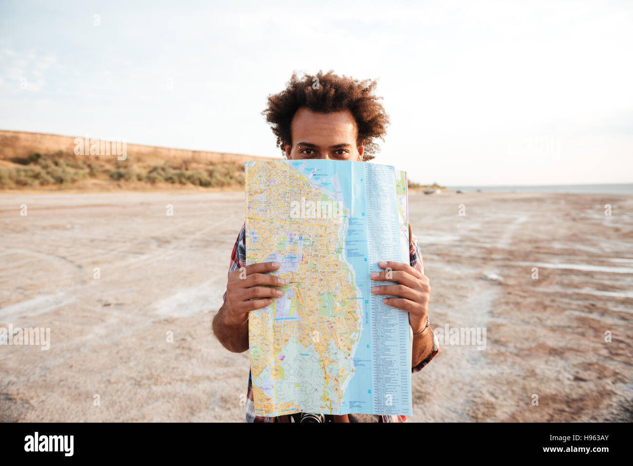 Young black hiker map backpack hi-res stock photography and images - Alamy