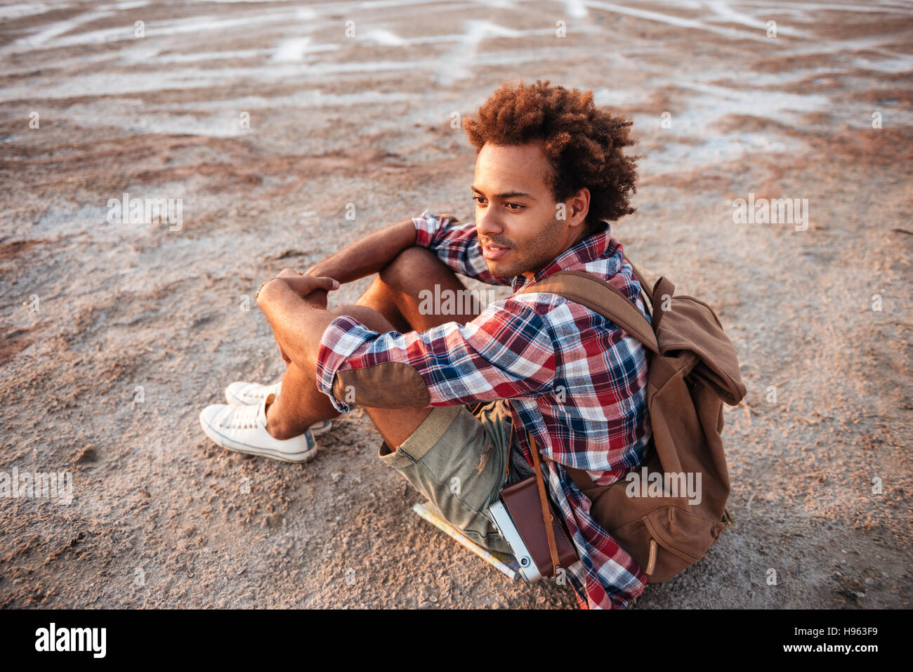 Young black man thinking hi-res stock photography and images - Alamy