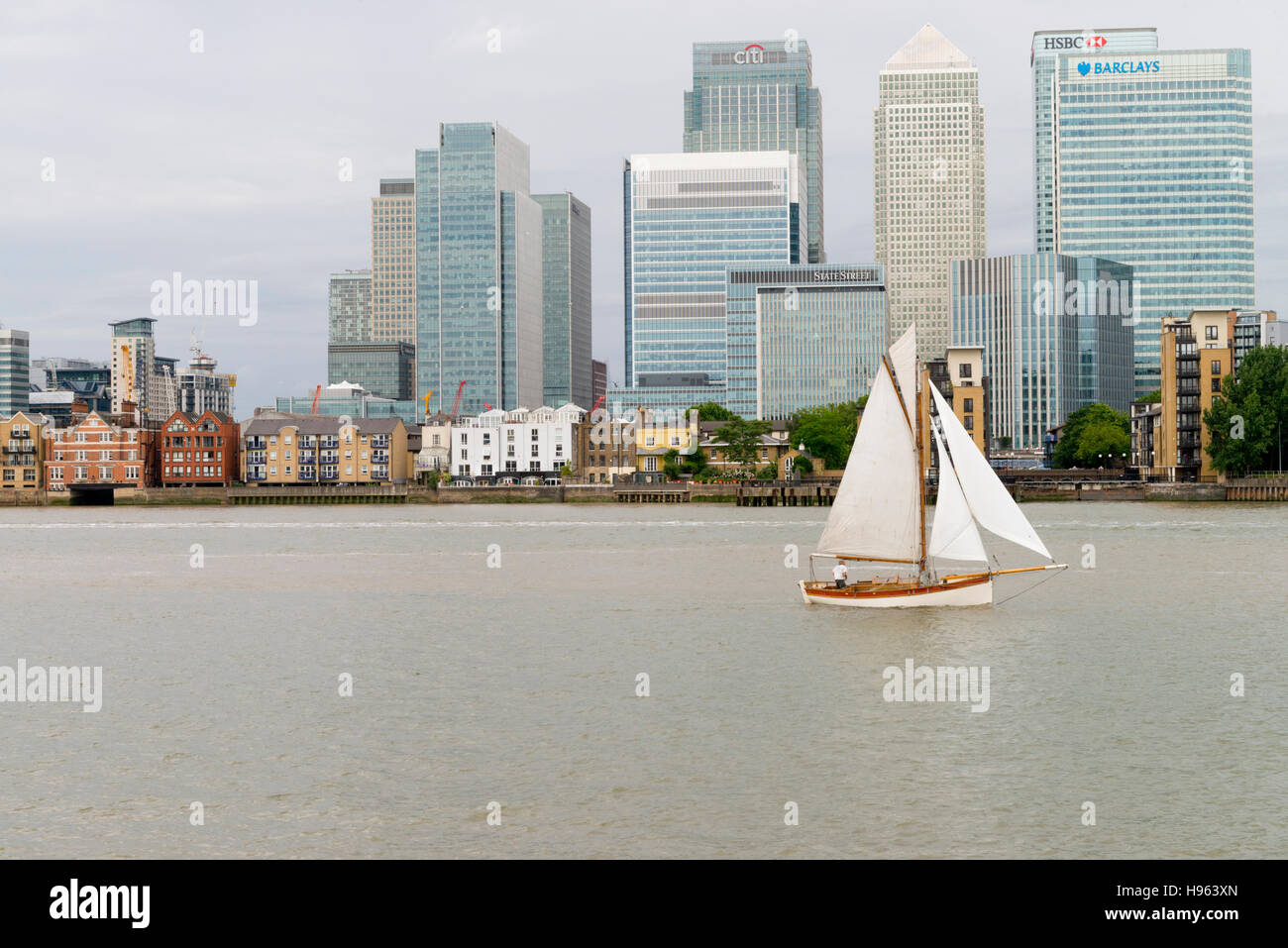 Sailing boat Canary Wharf and river Thames Stock Photo Alamy