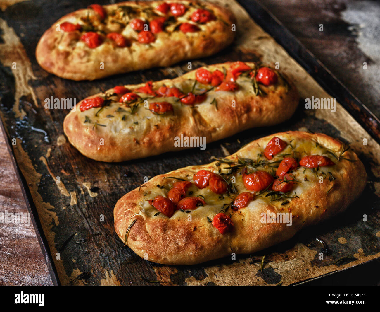 Ciabatta pizza bread tomatoes, rosemary Artisan bakery Stock Photo