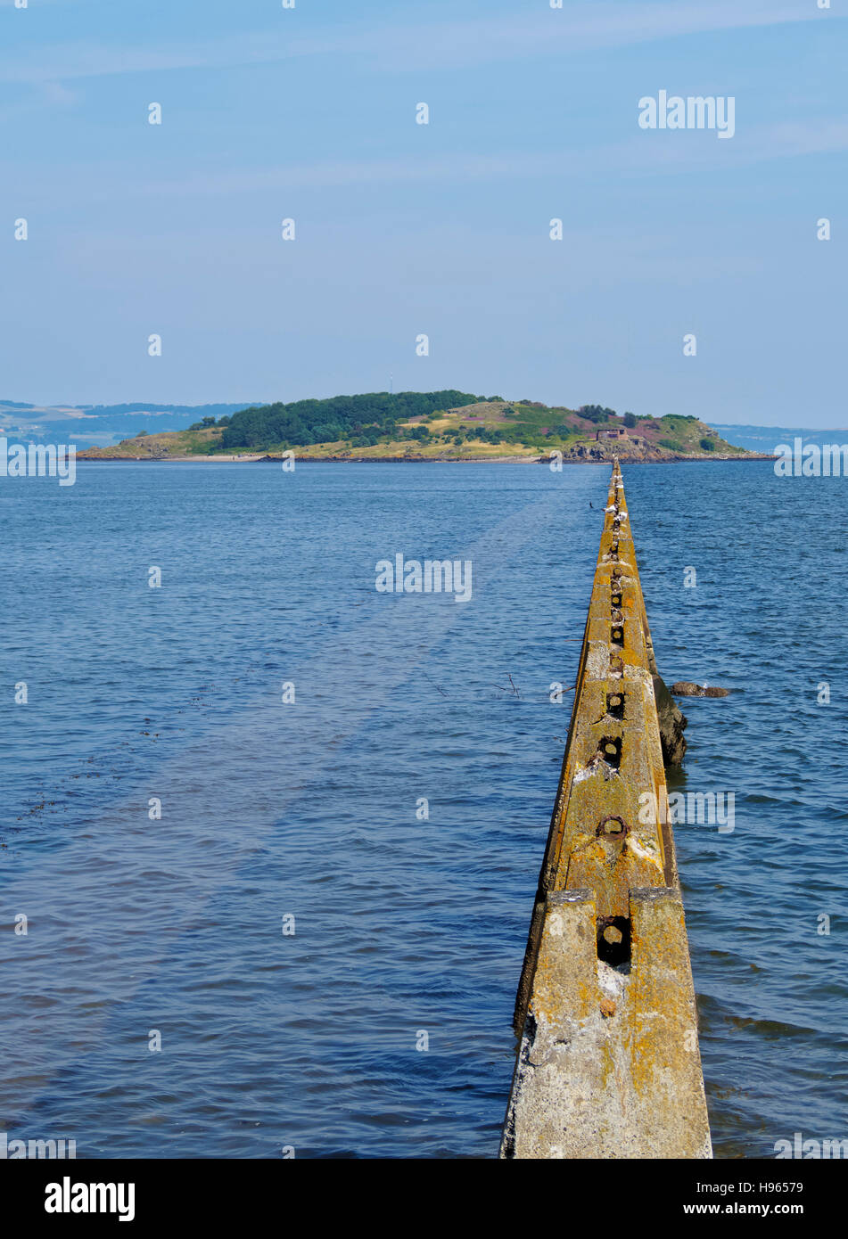 UK, Scotland, Lothian, Edinburgh Area, Cramond, Causeway and Pylons leading to the Cramond Island at high tide. Stock Photo