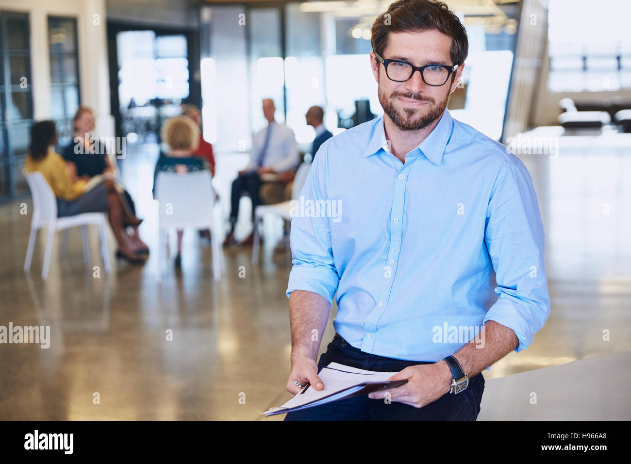 Portrait smiling businessman in office Stock Photo - Alamy