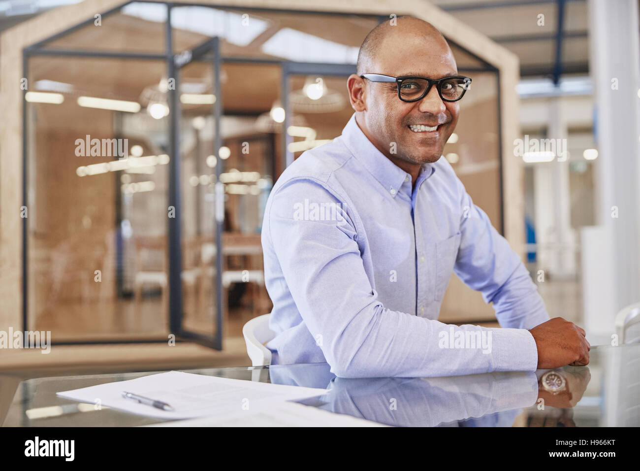 Portrait smiling businessman in office Stock Photo - Alamy