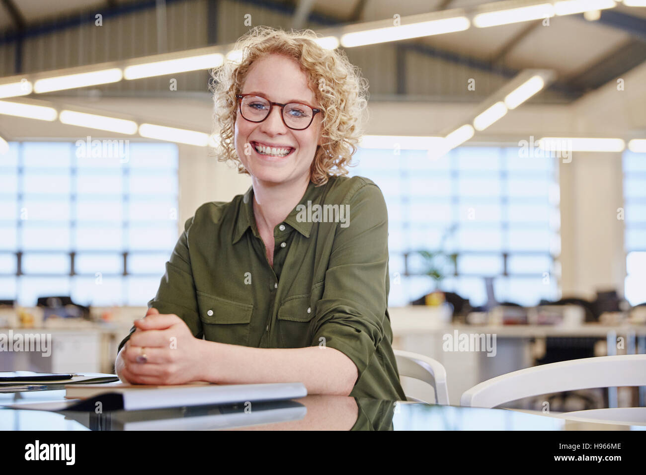 Portrait smiling businesswoman in office Stock Photo - Alamy