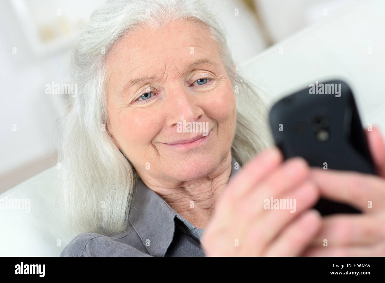 grandmother talking on mobile phone Stock Photo - Alamy