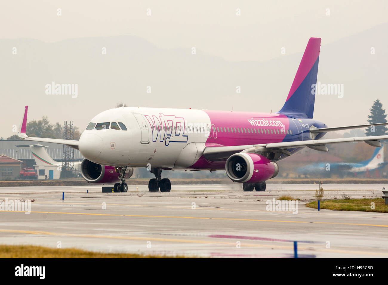 Sofia, Bulgaria - October 16, 2016: Wizz Air airplane on the runway after landing at the airport. Stock Photo