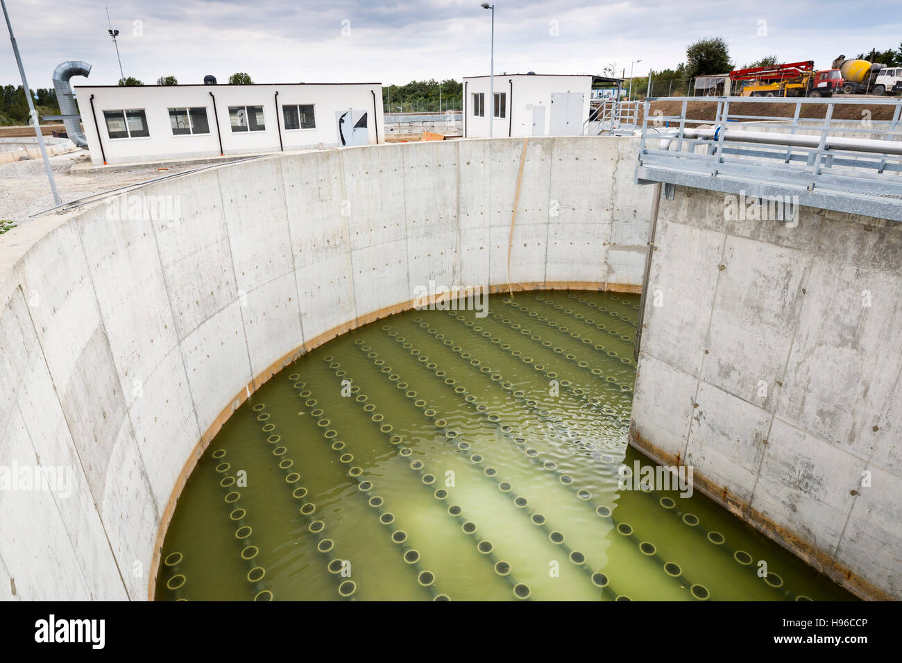 Modern urban wastewater treatment plant. Water cleaning facility outdoors. Water purification is the process of removing undesirable chemicals, suspen Stock Photo