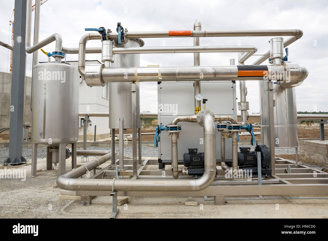 Natural gas tank. Oil and gas processing plant with pipes. LPG gas