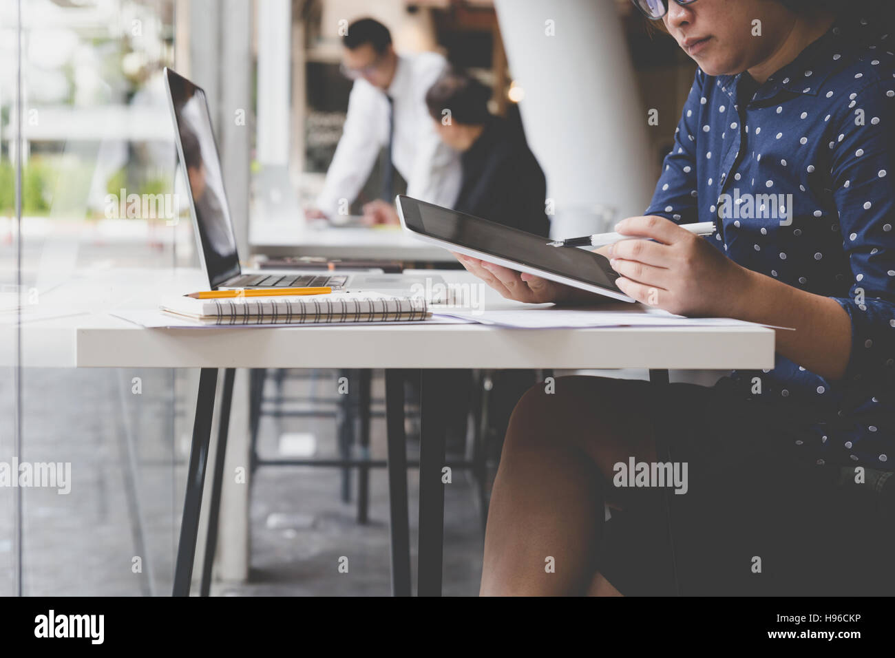 businesswoman working with tablet and laptop computer for use as office ...