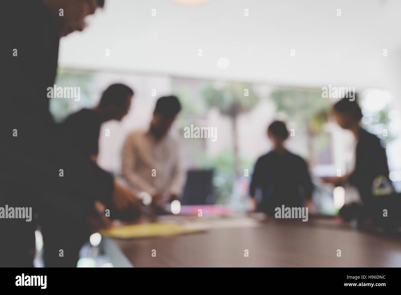 people meeting and working in office workplace - blur background Stock Photo