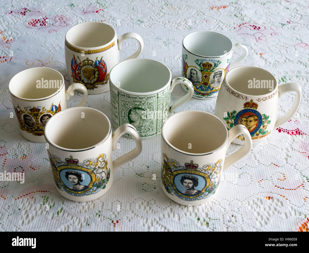 Collection of mugs celebrating various royal events, from Queen